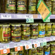 Rows of pickle jars at supermarket